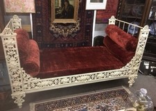 Antique Victorian cream cast iron single day bed, red bolster cushions