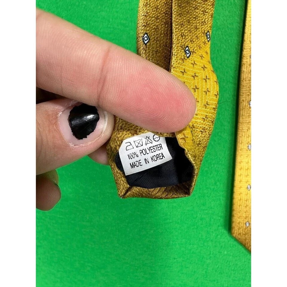 Corbata Romario Manzini a rayas de diamantes amarillos Foto 3 de 4