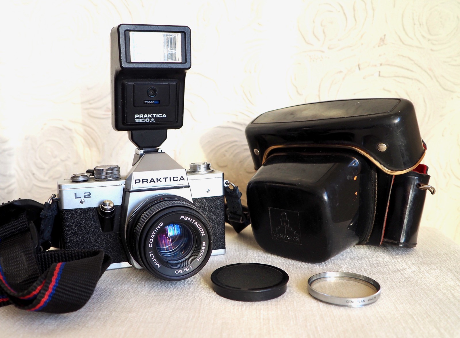 Vintage PRAKTICA L2 35mm film SLR camera kit with lens and extras