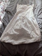 Clothing lot. Comprised of dresses, jackets, and etc.