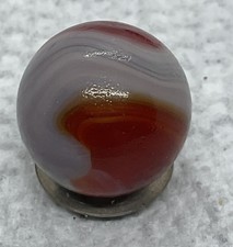 A Vintage Akro Agate Three Color. Corkscrew Marble. Measures .66 Mint Condition