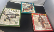 Uncover a T-Rex, Human Body, Shark Board books By Dennis Schatz,