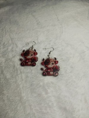 These Cute Highland Cow Earrings Are 1''.  She Displays Hearts And Flowers.