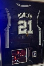Tim Duncan Autographed Jersey – Custom Frame w/ Rookie Card + Proof Photo. rookie card picture