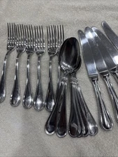 17 PC. GUY DEGRENNE VENISE OR VERLAINE STAINLESS FLATWARE SET.