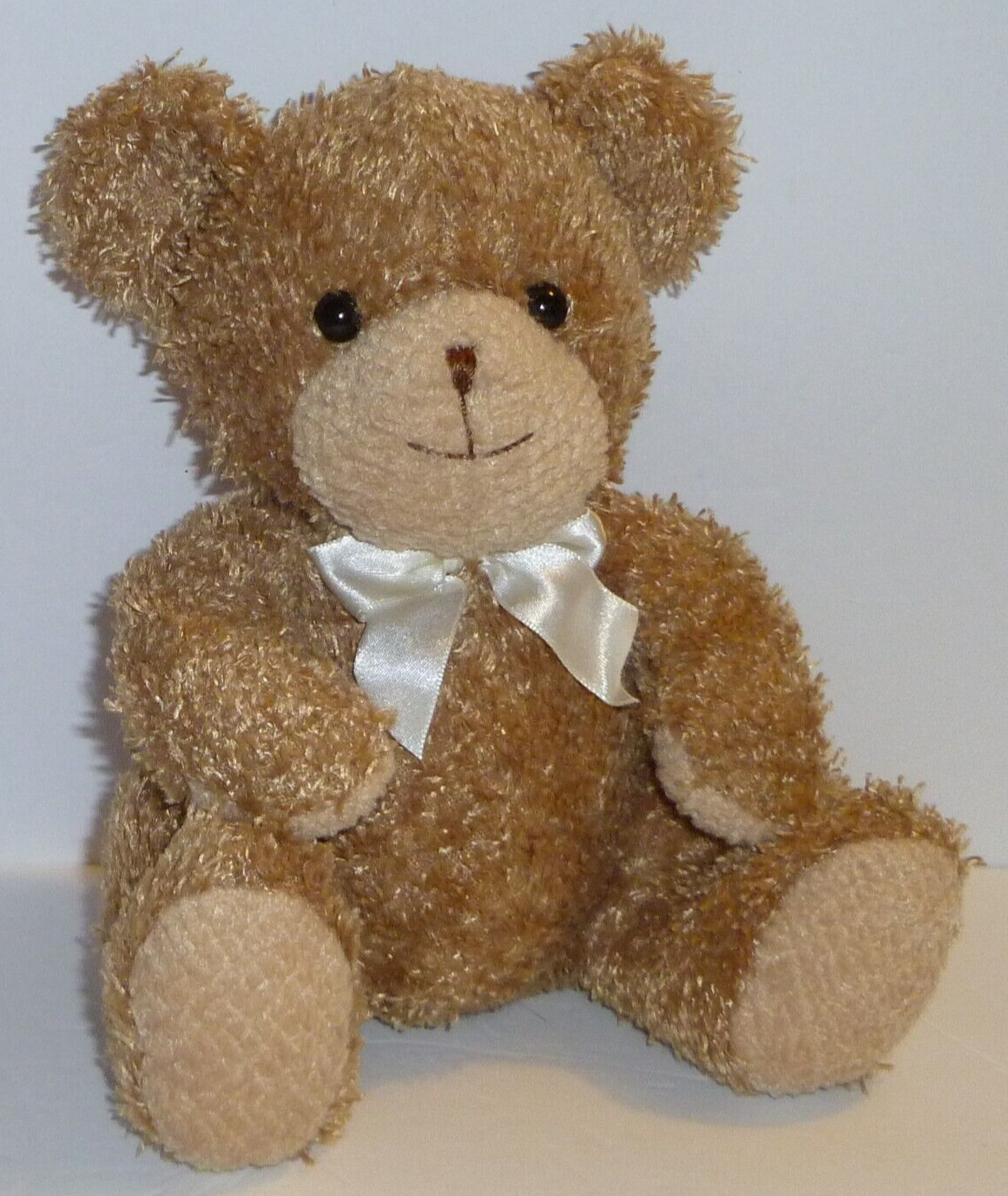 Cute 8-inch bear plush baby rattle toy by Prestige Toy Corp