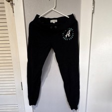 A ropostale Women's Black Regular Pants with Logo Accent Pattern
