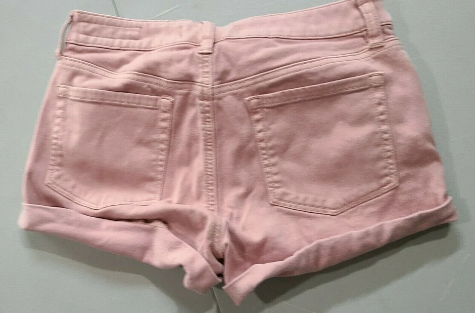 Pantalones Cortos Bullhead Súper Elastizados Juniors Talla 26x1.5 Rosa Frente Plano Puños Foto 2 de 4