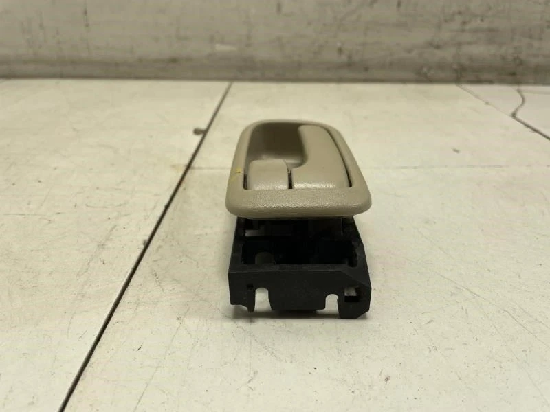 Toyota Highlander 2006 HV manija de puerta interior trasera izquierda con bisel embellecedor marfil Foto 3 de 4