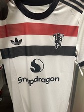 This is an Adidas Manchester United 2024-25 authentic third jersey