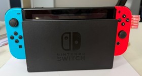 Nintendo Switch 32GB Console with 4 Joy-Con Controllers, 3 games and charger