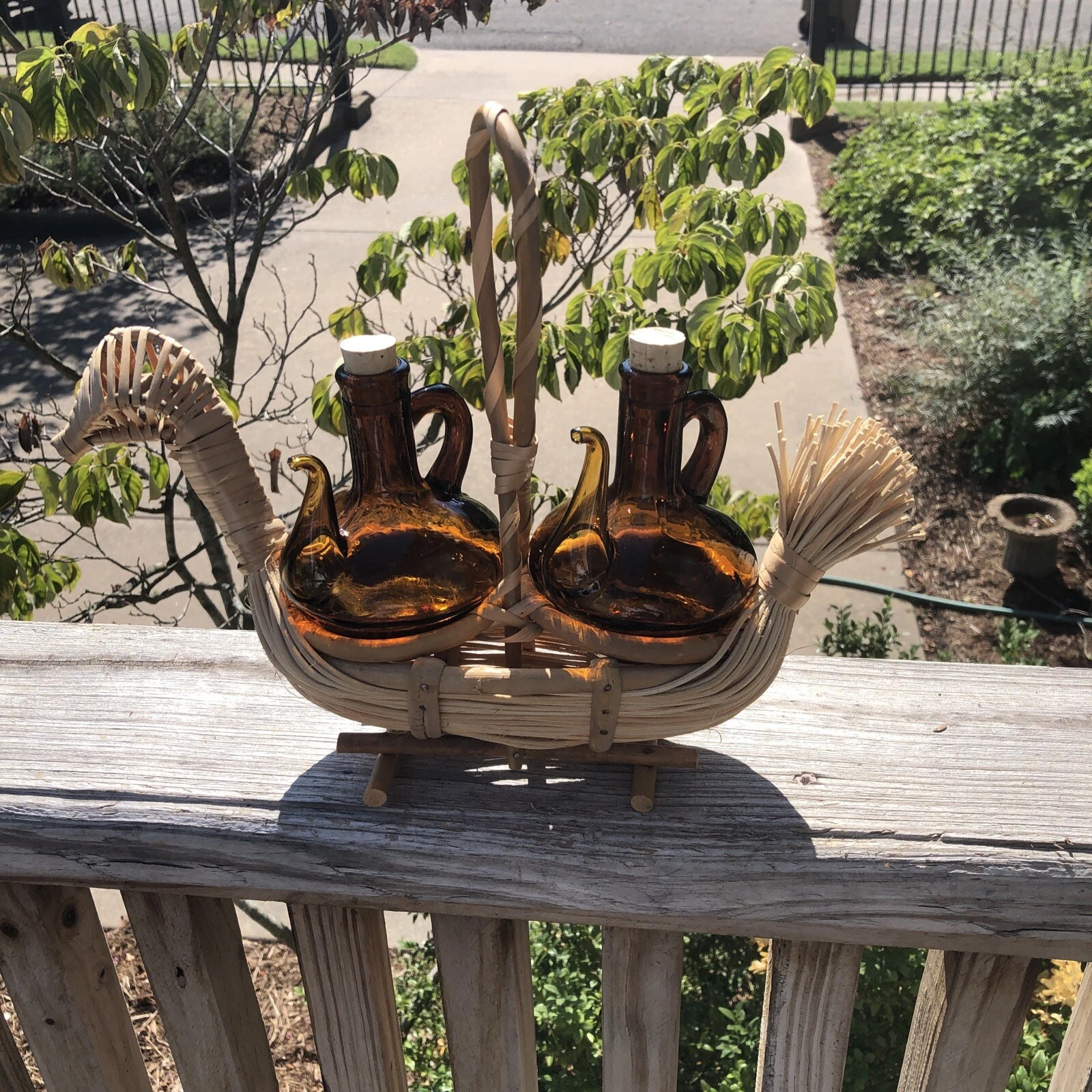 VINTAGE Amber GLASS OIL & VINEGAR CRUET SET IN WICKER HANDLED BIRD BASKET