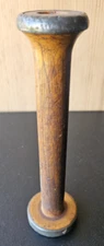 WOOD SPOOL.  SOLID WOOD/ METAL ENDS.  ANTIQUE PATINA. 9 INCH. ONE END IS WIDER
