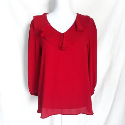 red ruffle neck blouse