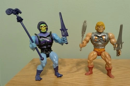 1984 Vintage MASTERS OF THE UNIVERSE Battle Armor He-Man And Skeletor w/ Weapons
