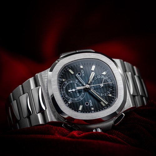 Patek Philippe Nautilus Travel Time Chronograph Blue Dial 5990/1A Complete Set
