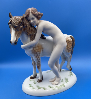 ROSENTHAL GERMANY PORCELAIN FIGURINE OF A LADY HUGGING A DAPPLED