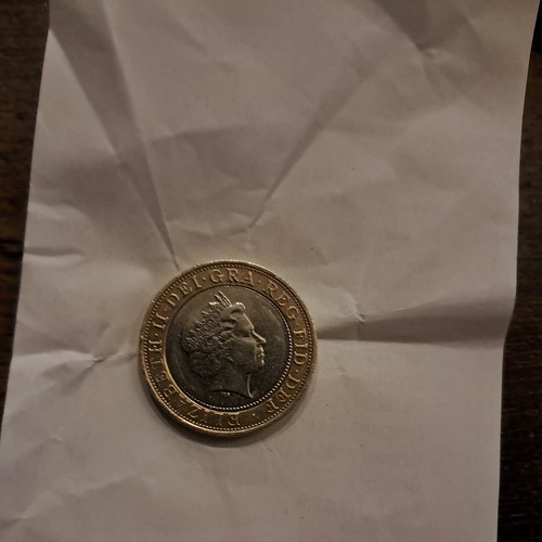 rare-minting-error-charles-darwin-2009-2-pound-coin-uk-coins-man