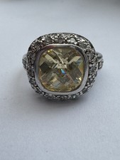 925 Silver Halo Ring With White And Yellow Stones Size O