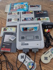 Super Nintendo SNES console with 9 games including Mariokart