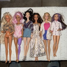 lot of 6 barbie dolls