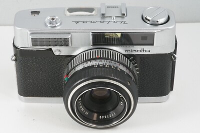 minolta uniomat first version ligtmeter works 1:2.8mm lens clean .