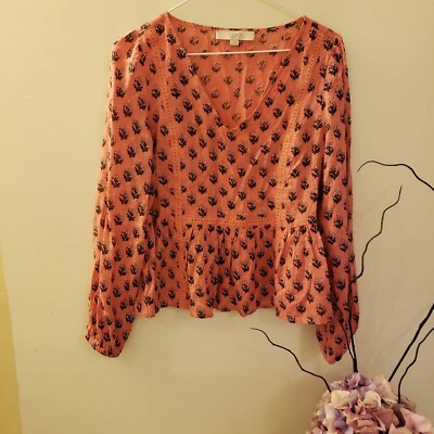 Loft pink long sleeve floral flutter bottom in small