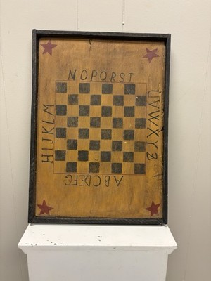 Hand-painted American folk art checkerboard game board with stars.