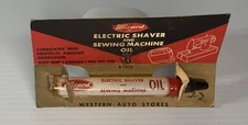 VINTAGE WIZARD BRAND ELECTRIC SHAVER AND SEWING MACHINE OIL. CARDED FOR DISPLAY!