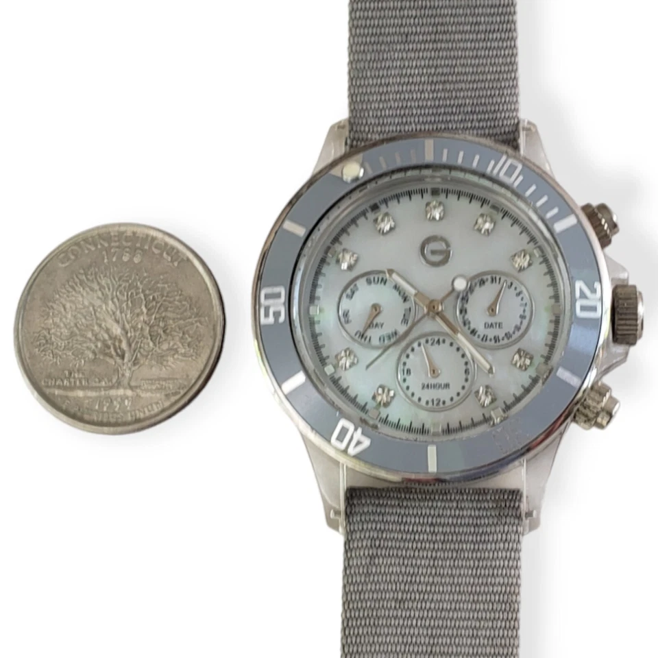 Reloj cronógrafo Gossip para mujer con bisel gris esfera madreperla caja transparente VX3J Foto 2 de 4