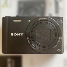 Sony Cyber-shot DSC WX300 Digital Camera with Jacket Case and Memory Stick
