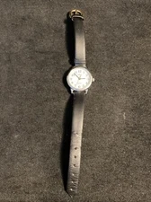 Vtg Timex Womens Watch Silver Tone Round Analog Face Watch Black Leather Band