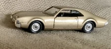 Solido￼￼  ~1966 Oldsmobile Toronado~  1:43  *Working Dome Light*  -Gold -France