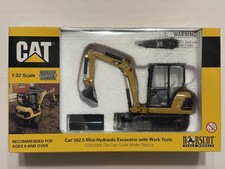 MINIESCAVATORE NORSCOT SCALA 1/32 CAT302.5 con attrezzi da lavoro, #55085, scatola nuova sigillata