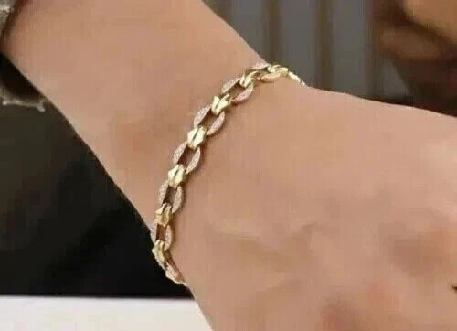 Elegante brazalete de tenis enchapado en oro amarillo de 14 k con diamantes simulados de corte redondo de 5 quilates Foto 3 de 4