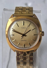 Vintage 70's Timex Electric 36mm Gold Tone Champagne Dial Watch