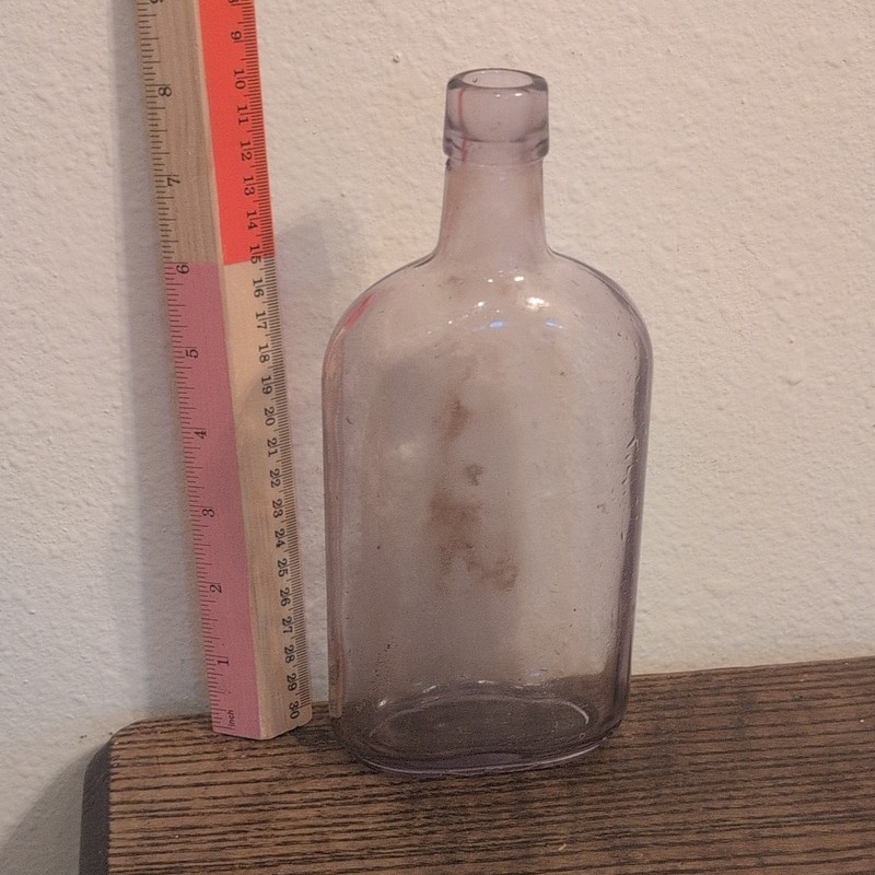 Antique Purple Glass Whiskey Bottle.