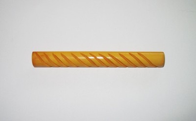 Carved Bakelite bar pin in signature yellow. Accessory for a top or even a hat.