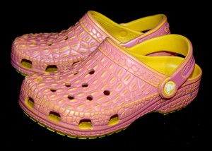 yellow and pink crocs