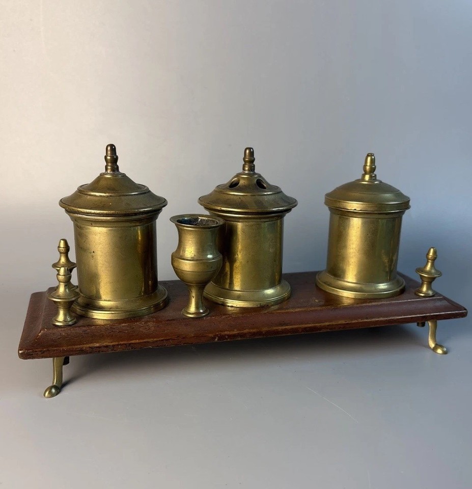 A genuine 18th/19th-century brass desk set with a pounce pot — an actual piece of history you can use as a desk accessory.