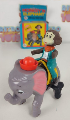 Monkey 'N Elephant Wind Up Molla Rock Along Scimmia Cavalca Elefante Ales Al-Es