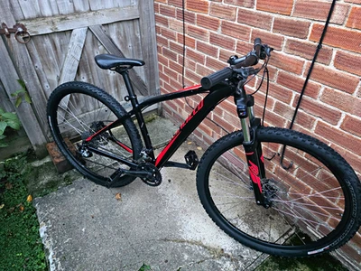 Specialised rock hopper with 26 inch mountain bike wheels and hydraulic brakes
