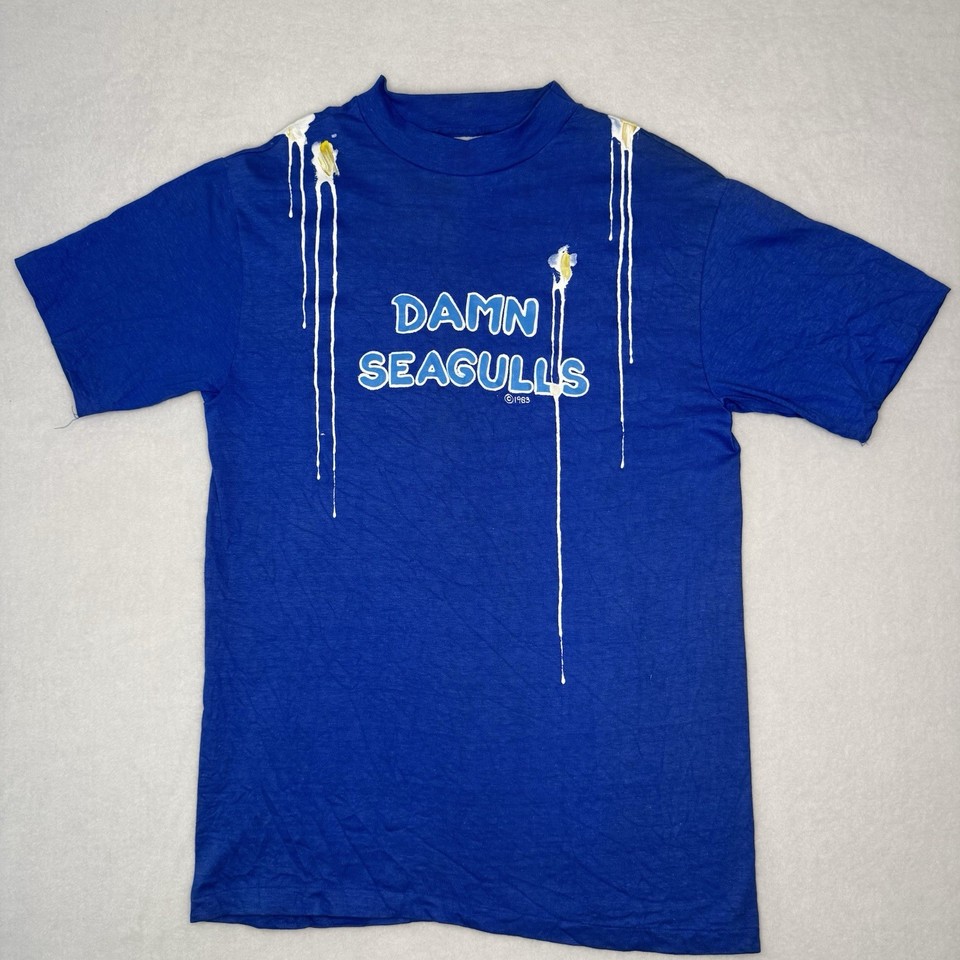 A genuine single-stitch USA-made 80s novelty tee cursing out seagulls — the kind of absurd, hyper-specific vintage shirt that stops a thrift-store scroll cold.