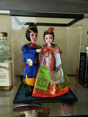 korean dolls in glass case