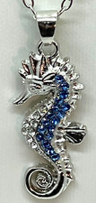 Necklace Silver Tone Seahorse Accented w/Blue Crystals. 1" Charm