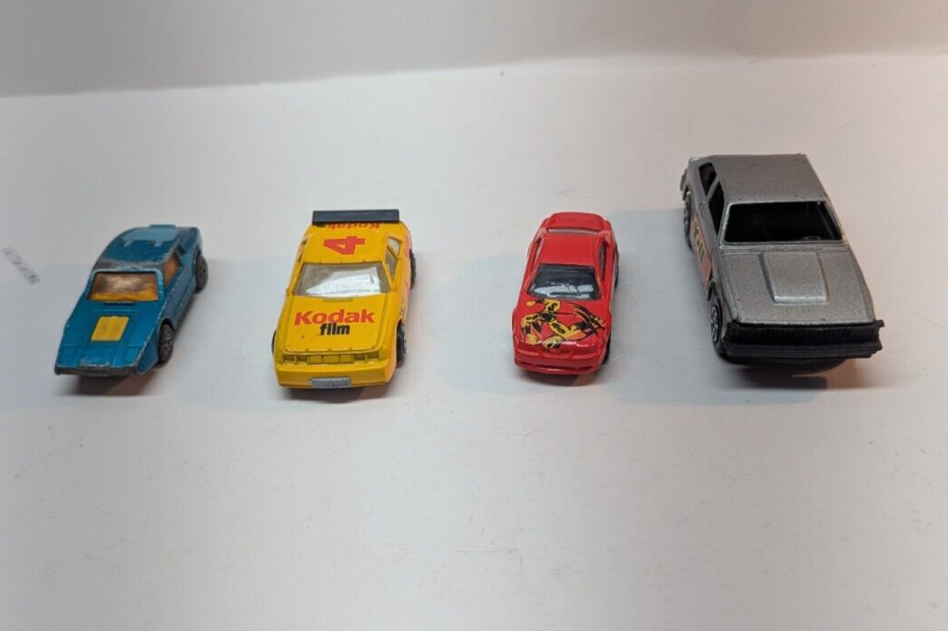 LOT OF 4 Matchbox Sonnet II Oldsmobile Delta Kodak Hot Wheels