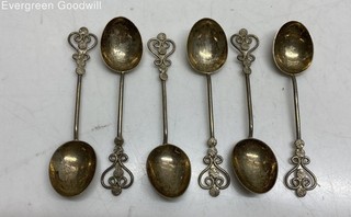 Six Metal Spoons