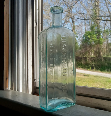 DR.FLINT'S QUAKER BITTERS APPLIED LIP 1880 BOTTLE WITH PEENED OUT SIDE PANELS