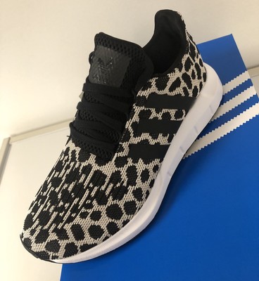 swift run leopard sneakers