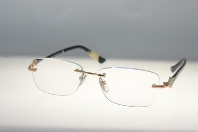 Please read Authentic BVLGARI 2169-B 376 52 17 140 ITALY right temple is damaged